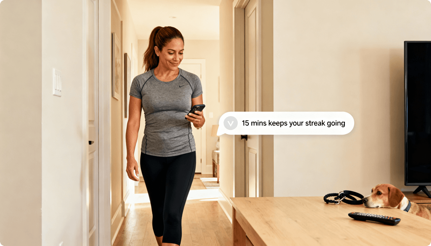 Woman walking with phone showing streak notification
